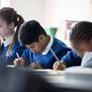 children at school writing